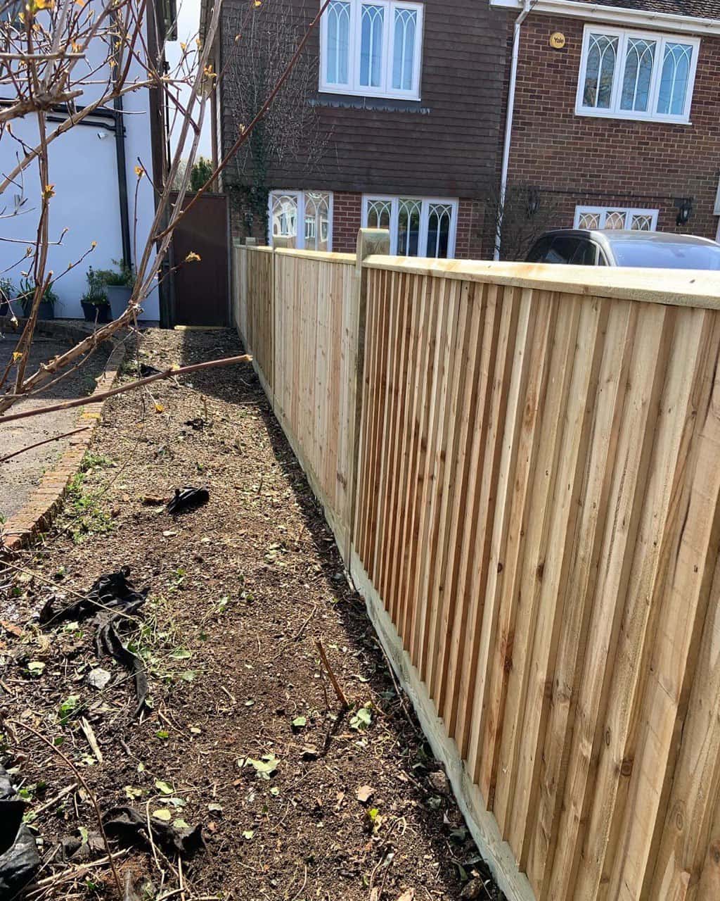 This is a photo of feather edge fencing installed in a residential property by Fast Fix Fencing Thetford